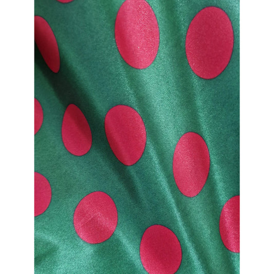 Tela satín bolas grandes verde con rojo por metro