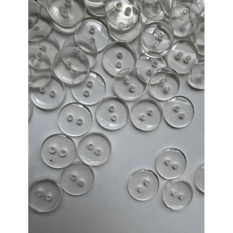 Botón Trikel Pasta Transparente Redondo 1.5 Cm 2 Hoyos 1.5 Mm