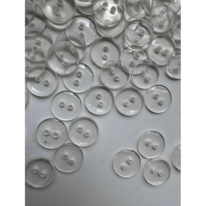 Botón Trikel Pasta Transparente Redondo 1.5 Cm 2 Hoyos 1.5 Mm