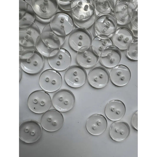 Botón Trikel Pasta Transparente Redondo 1.5 Cm 2 Hoyos 1.5 Mm